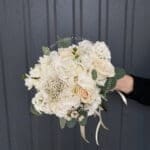Весільний букет з гортензією та хамелаціумом